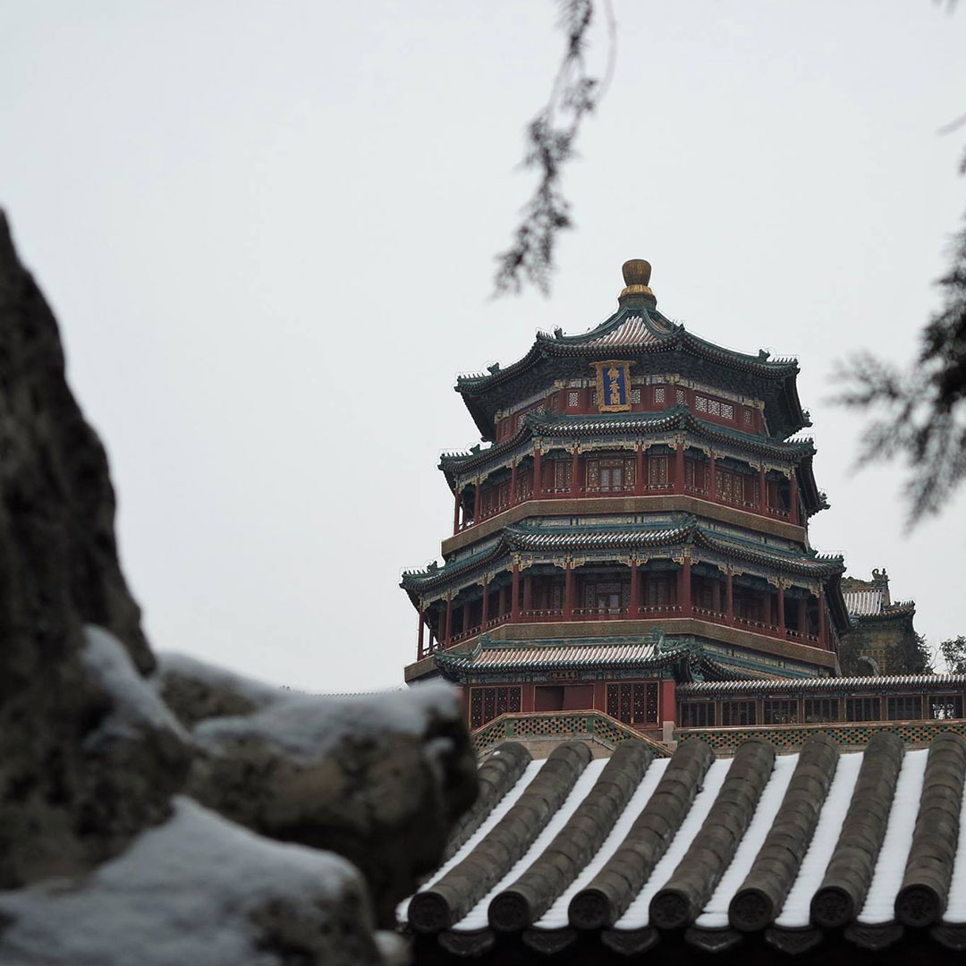Summer palace with snow on the rooftops