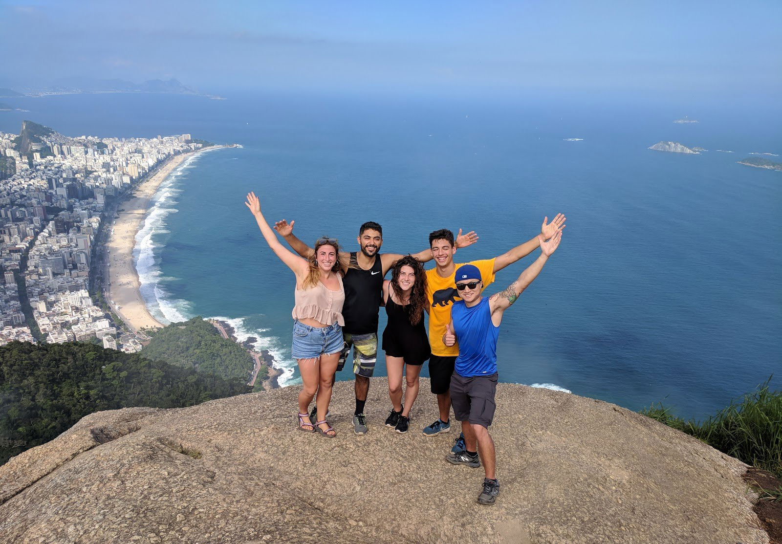 Ricardo with friends on a mountain top in Brazil