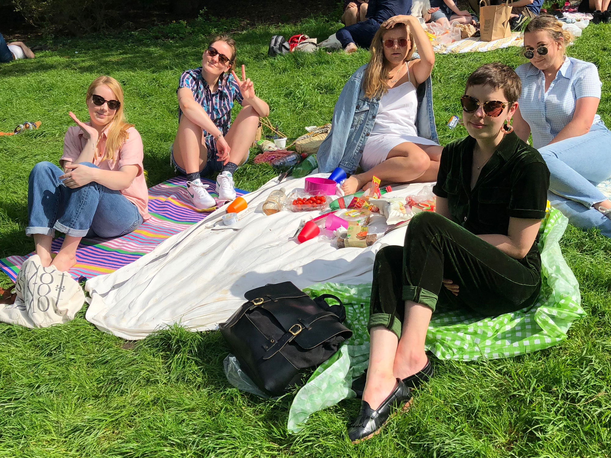 Six students enjoying a picnic in Paris France. 