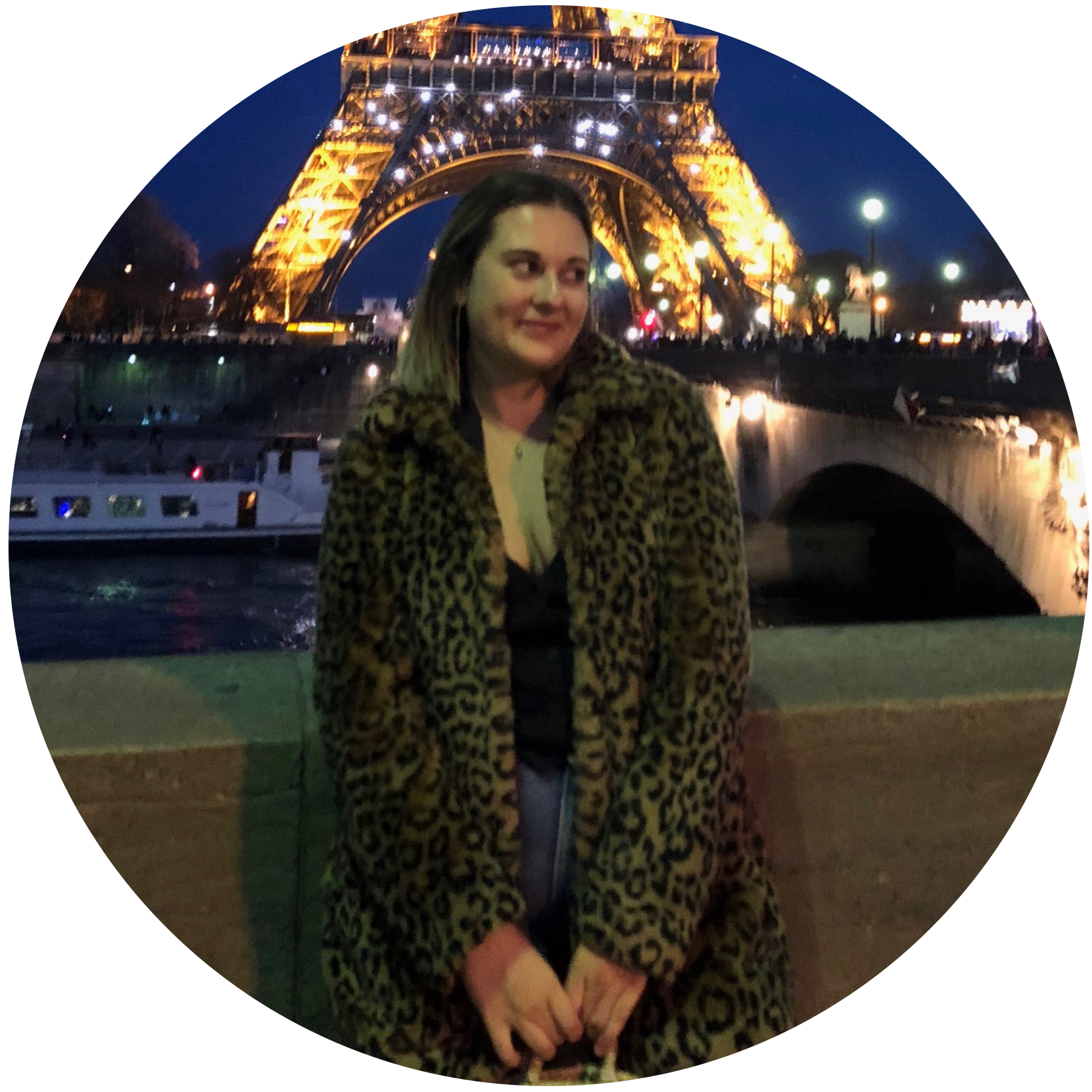 Liz Lemerand in front of the Eiffel Tower in Paris France.