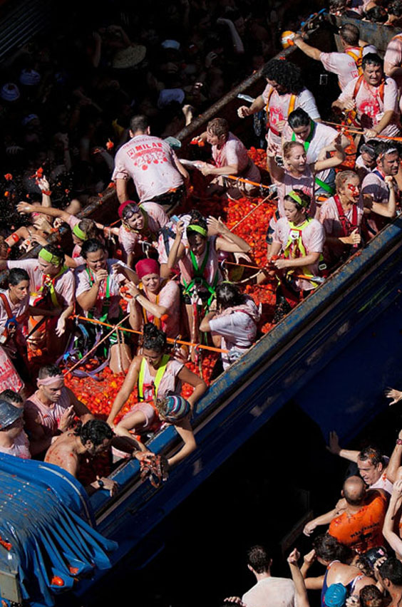 15. Join the world's largest tomato fight in Spain. Viva la food fight! The annual town-wide tomato fight in the streets of Buñol is something you'll never forget. See our list of epic adventures you can try on study abroad.