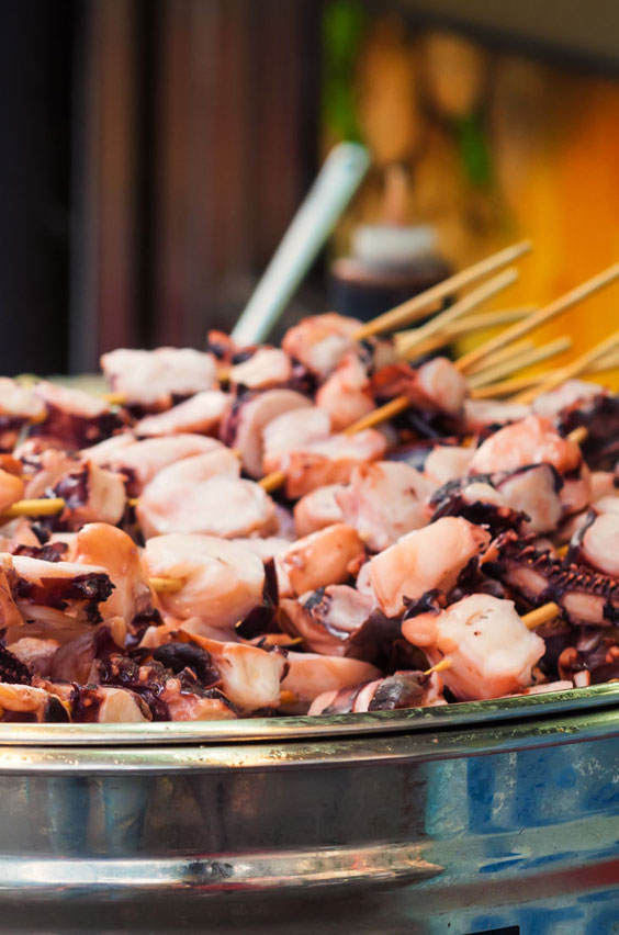 6. Eat tasty fried food on a stick in Korea. Seoul is a foodie paradise for snackers where food carts filled with delicious treats fried up and served on skewers line the streets. Add this adventure to your bucket list and check out a complete list on our blog.