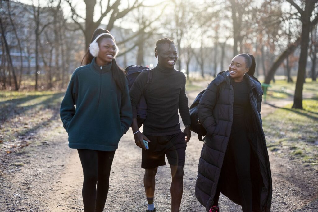 Three students walking in the cold weather