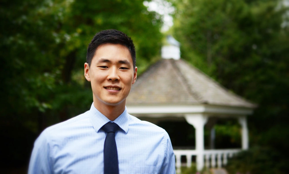 A young man in business attire