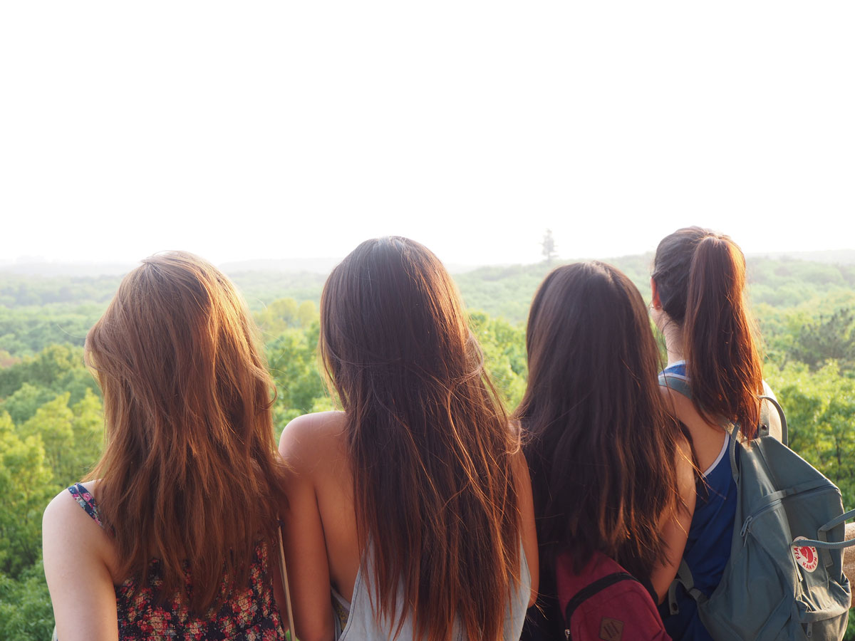 Friends watching the sunset over Mount Zijin in Nanjing