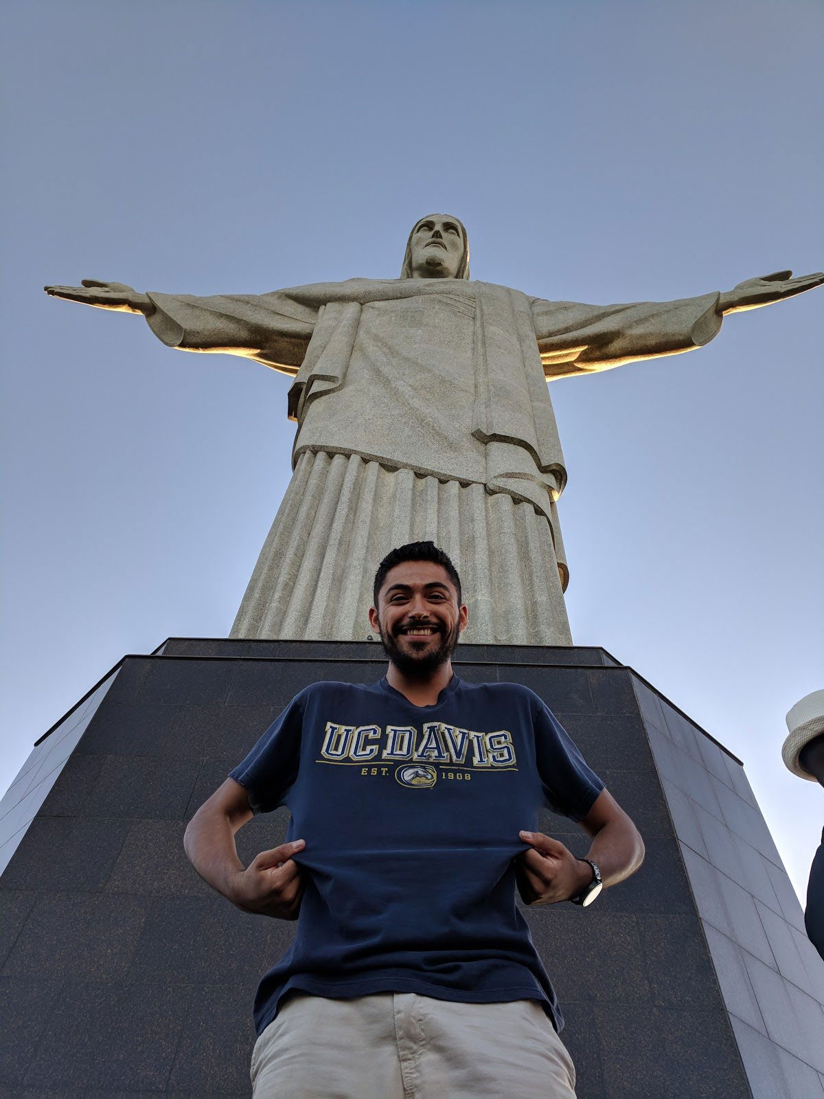 Ricardo standing in from of the Christ the Redeemer statue