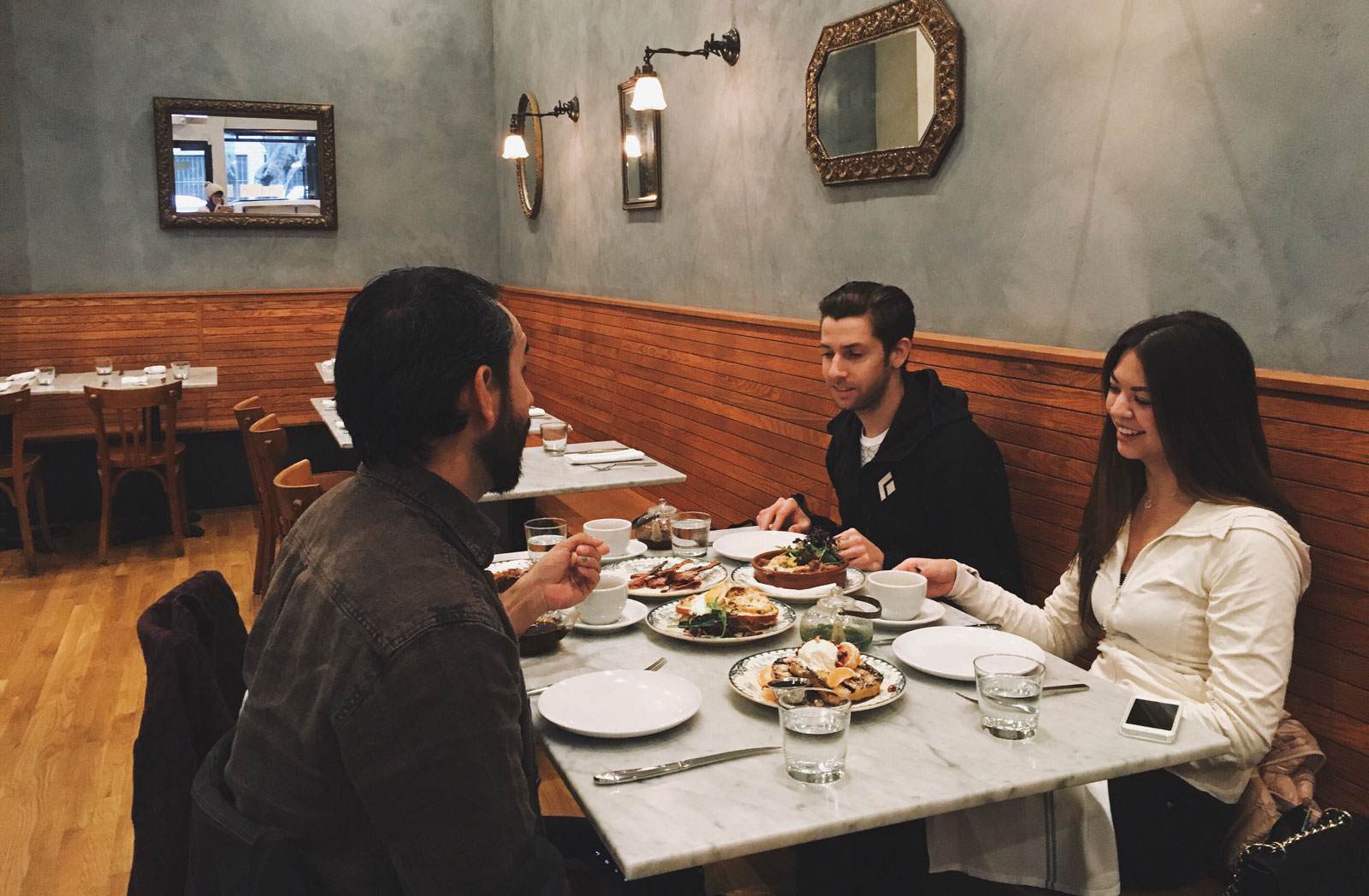 students sitting at a table out to dinner