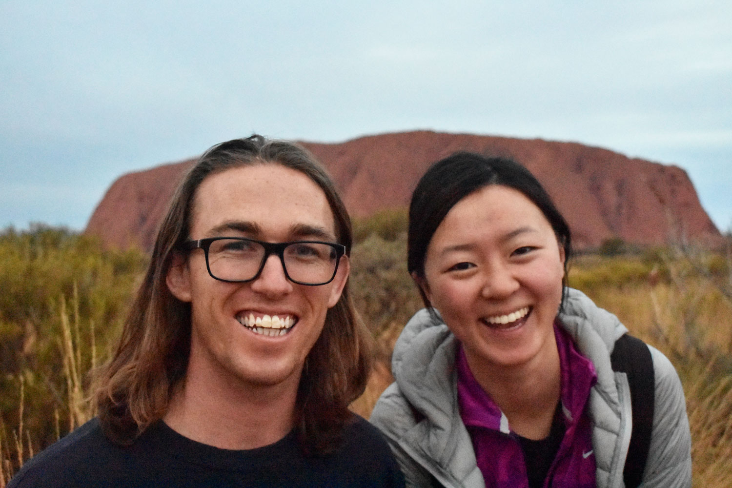 Waresa smiling for a photo with a friend from abroad