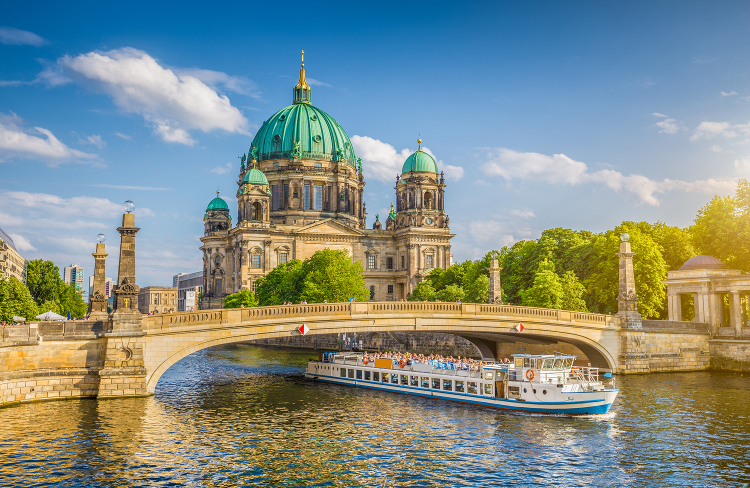 Berlin Cathedral with ship on Spree river at sunset, Berlin, Germany