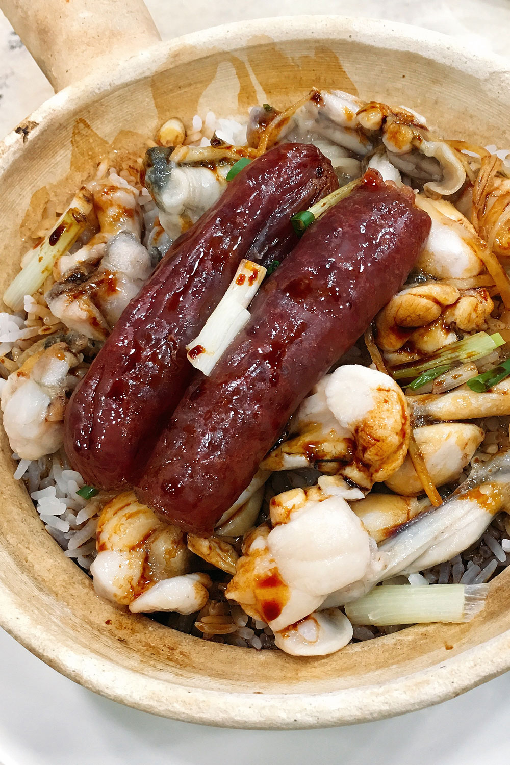 Claypot rice with rice veggies and meat in Hong Kong.