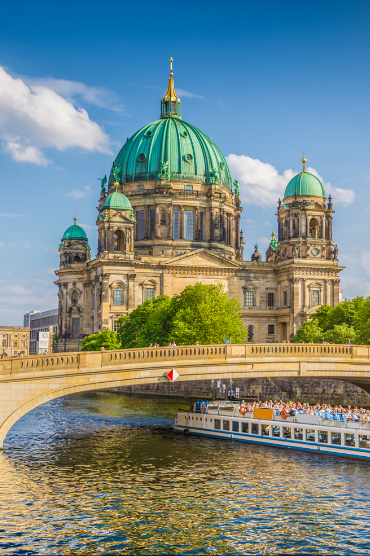 Berlin Cathedral with ship on Spree river at sunset, Berlin, Germany