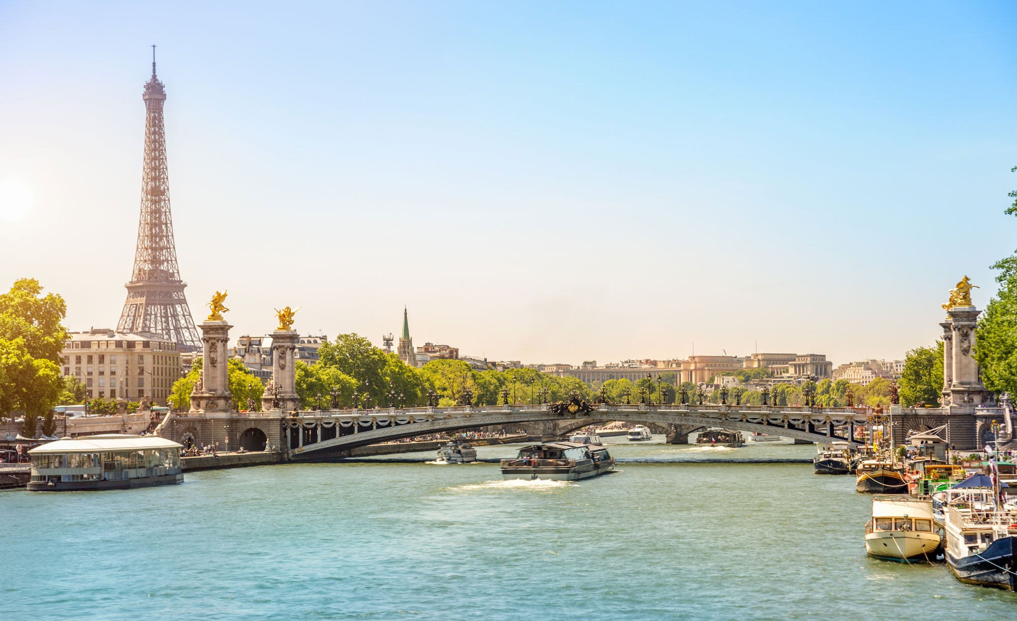 Eiffel Tower and Bridge Alexandre III over Seine River, Paris