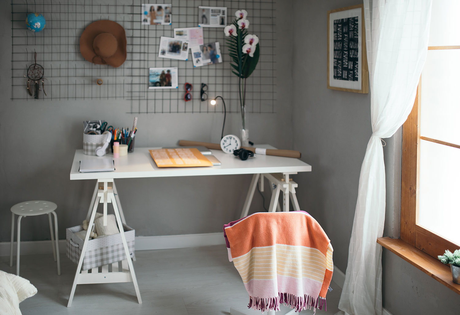 student's desk with decorations on the wall