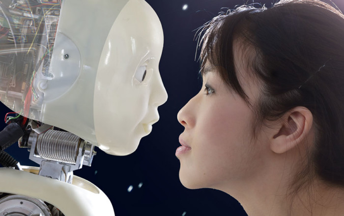 Woman and robot face to face.
