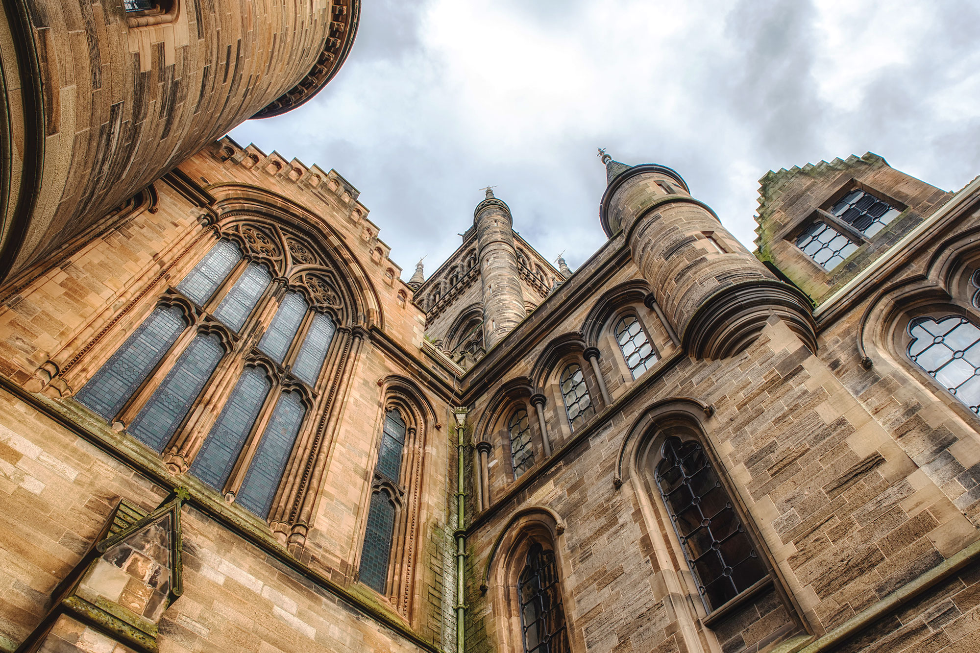 View looking up at exterior of the Main Building of the University of Glasgow, Scotland