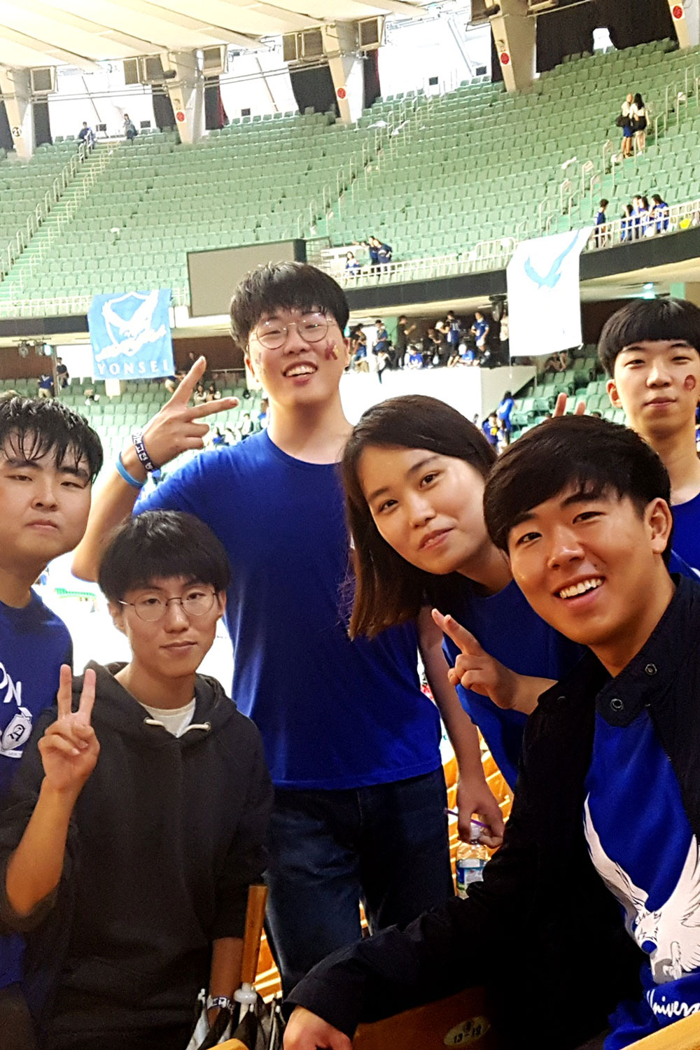 Brandon Yoon attends a sports festival with local students.