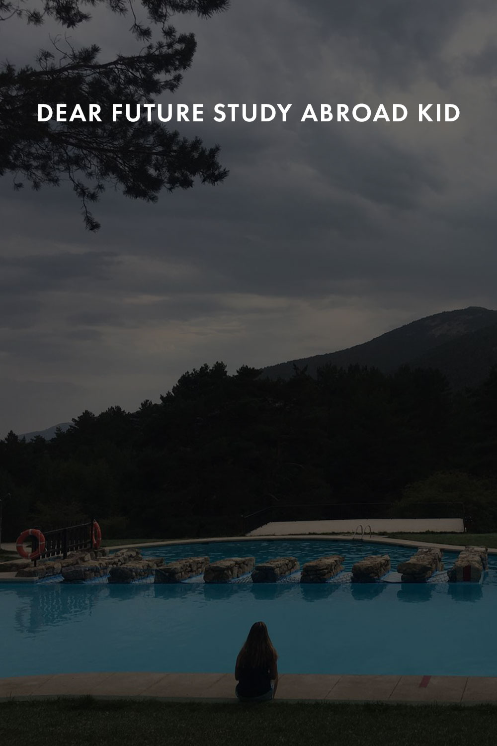 View of a pool near mountains. 