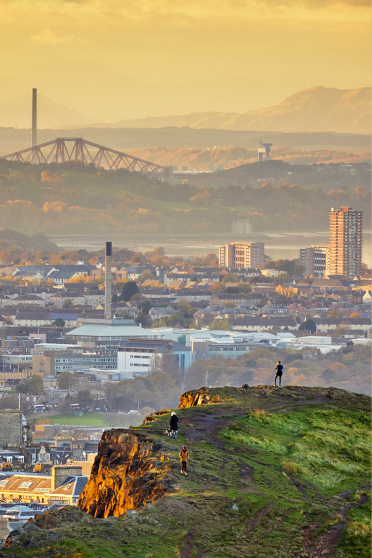 Edinburgh cityscape and skyline with Firth of Forth at sunset from Holyrood Park