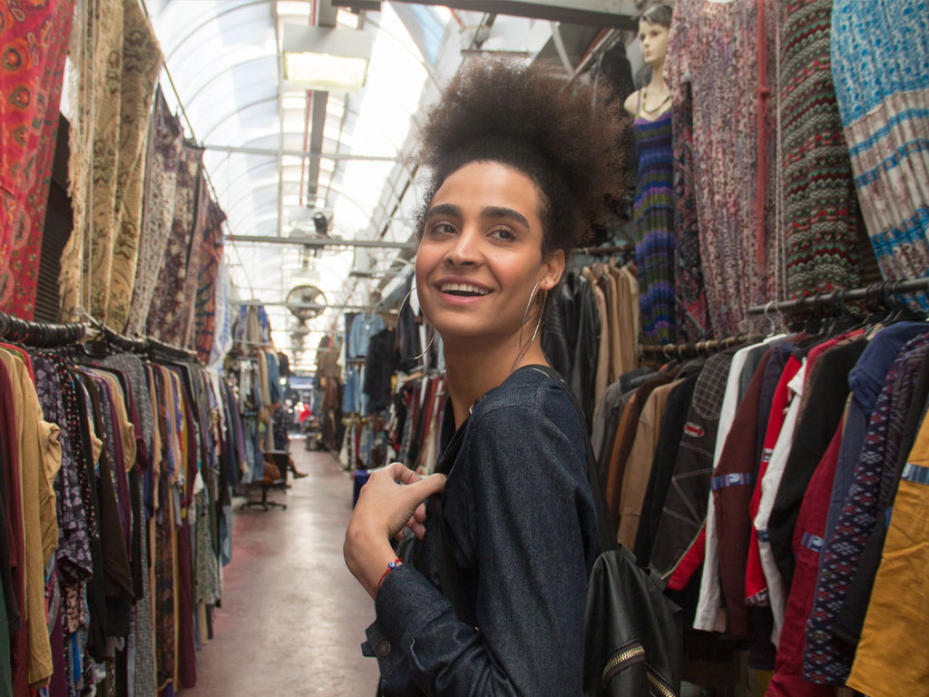 Student exploring a flea market