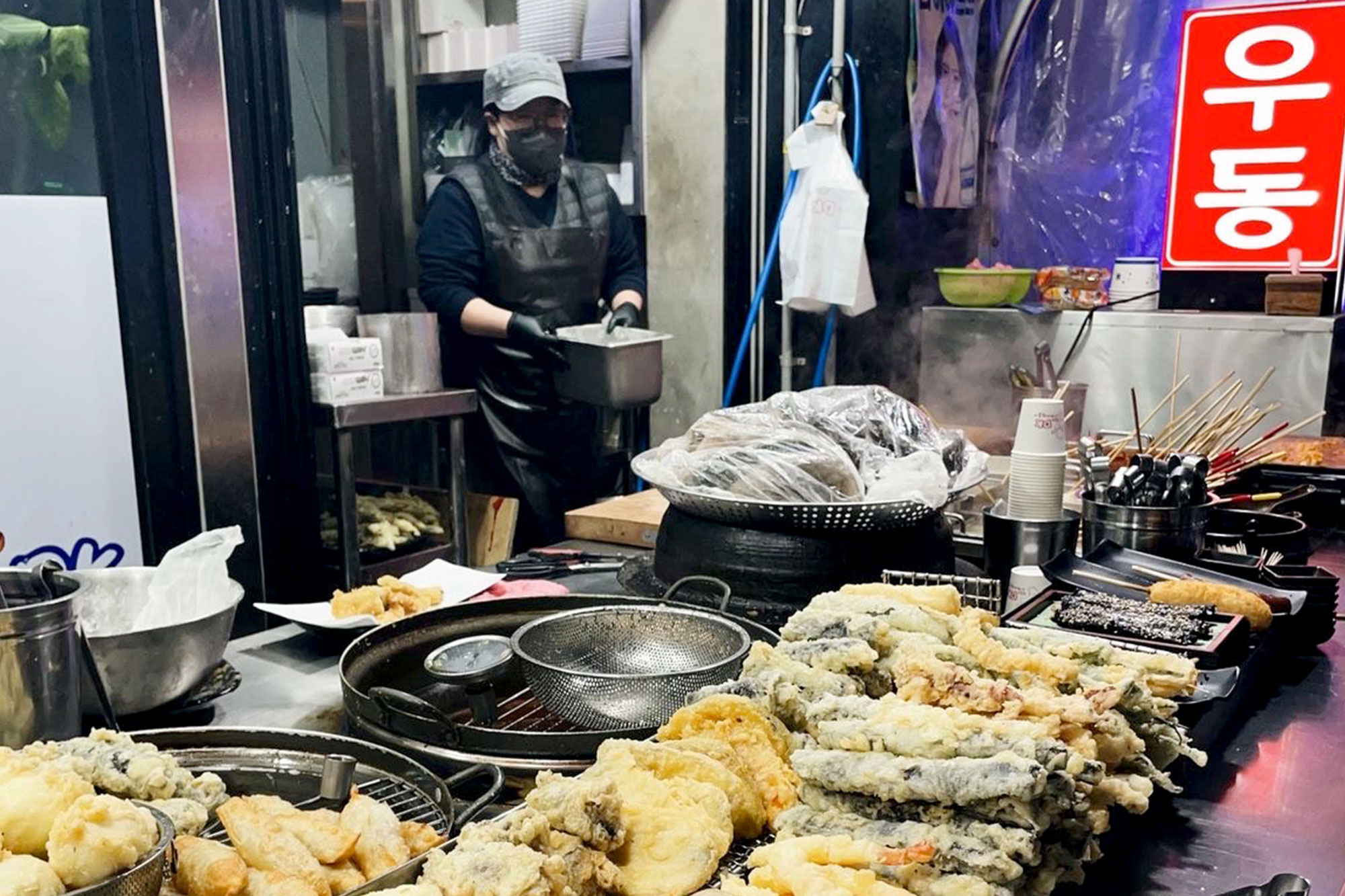 street food on grill in a food market in South Korea