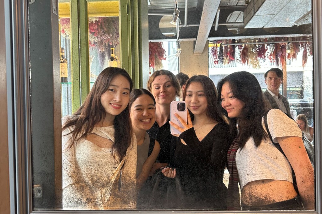 Group of students in a mirror