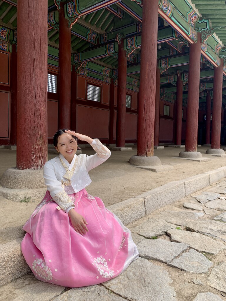 Young student in front of temple