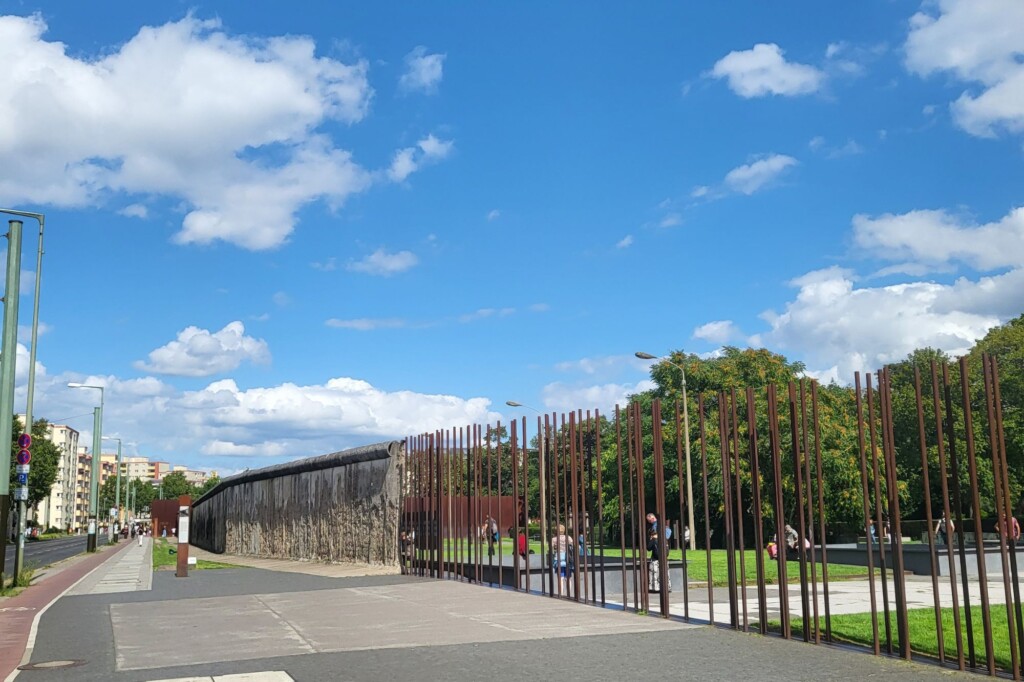 Memorial of the Berlin Wall with blue sky over