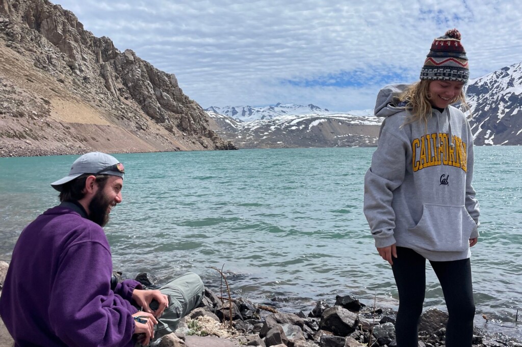 Jamie Stickelmaier and friend by a lake in Chile