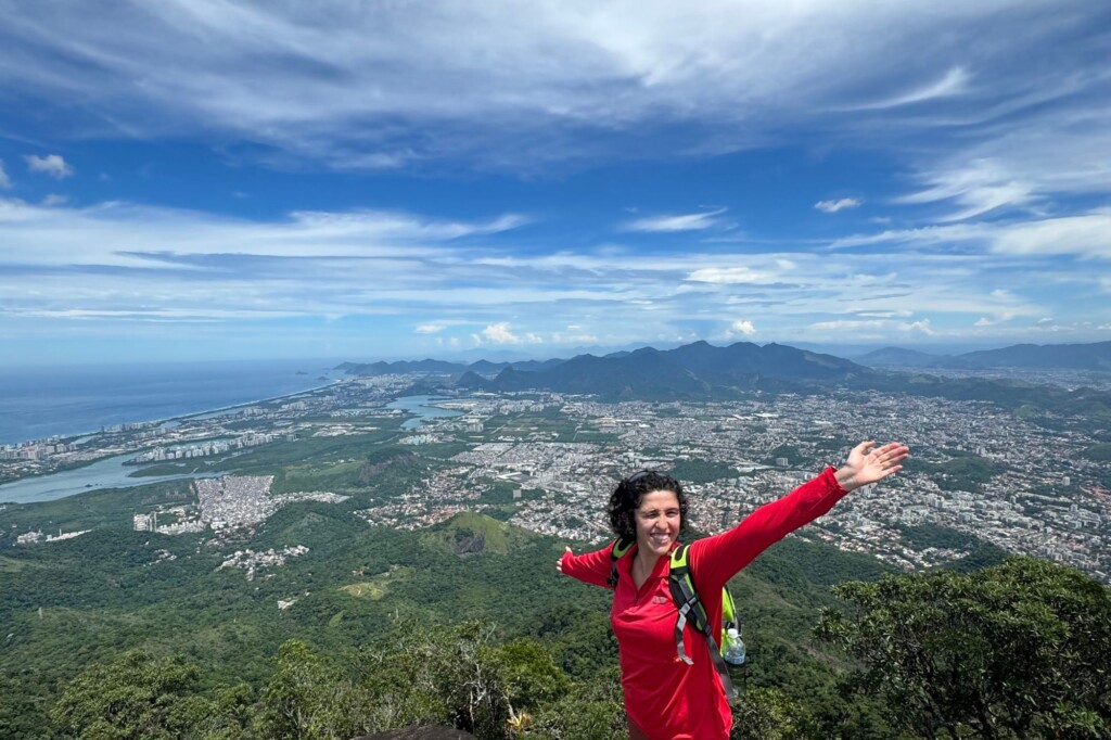 UC Berkeley student on top of hill overlooking Rio de Janeiro