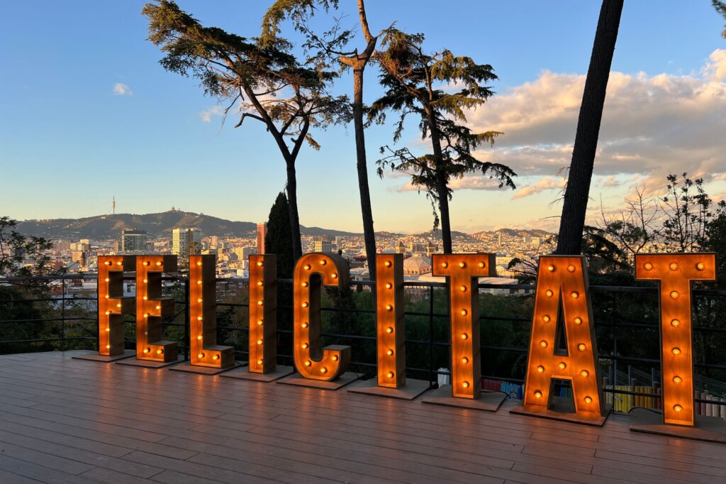 Lighted sign reading Felicitat - or meaning happiness