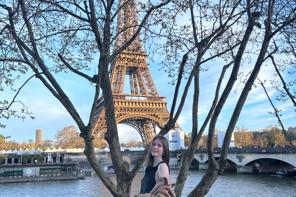 Kylee Cochran (UCI) posing at the Eiffel Tower in Paris