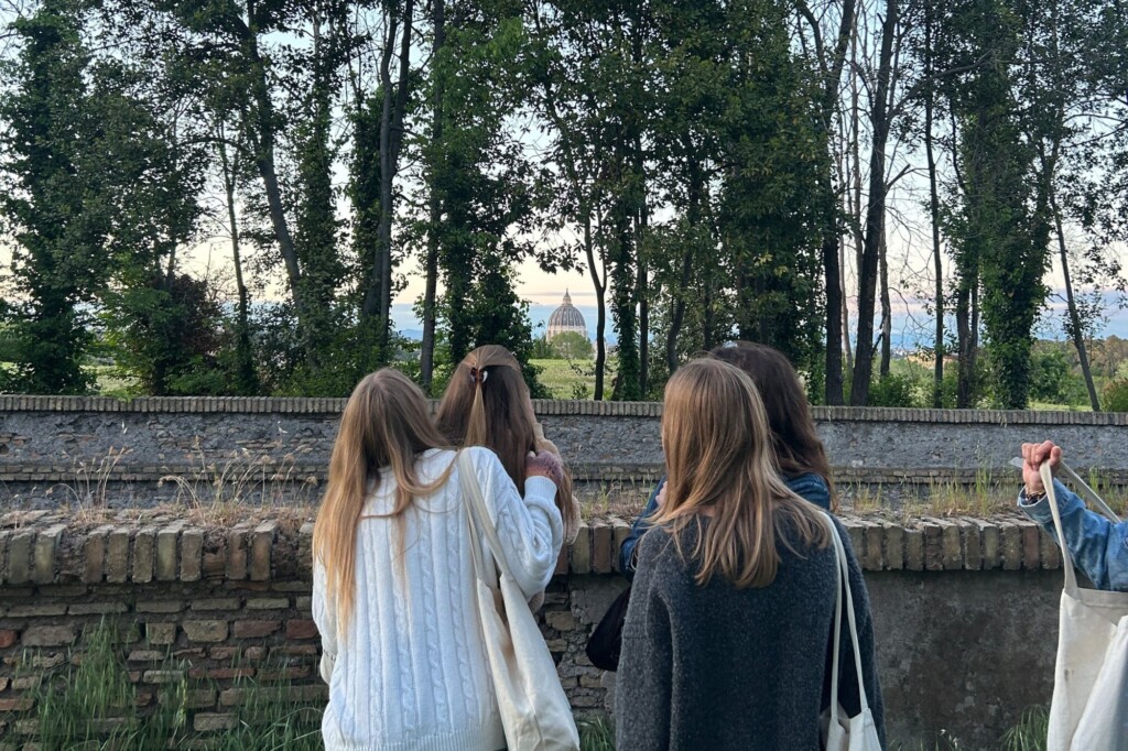 Students looking through trees at Rome