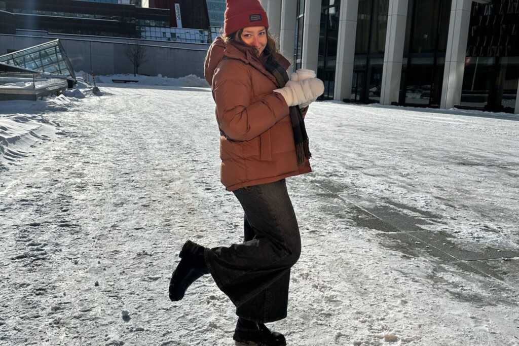 Lily Frohlich (UCSC) in Montreal with a coffee cup in the snow