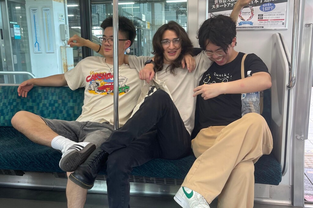 Harry Shih (UCSD) with friends on a train in Japan