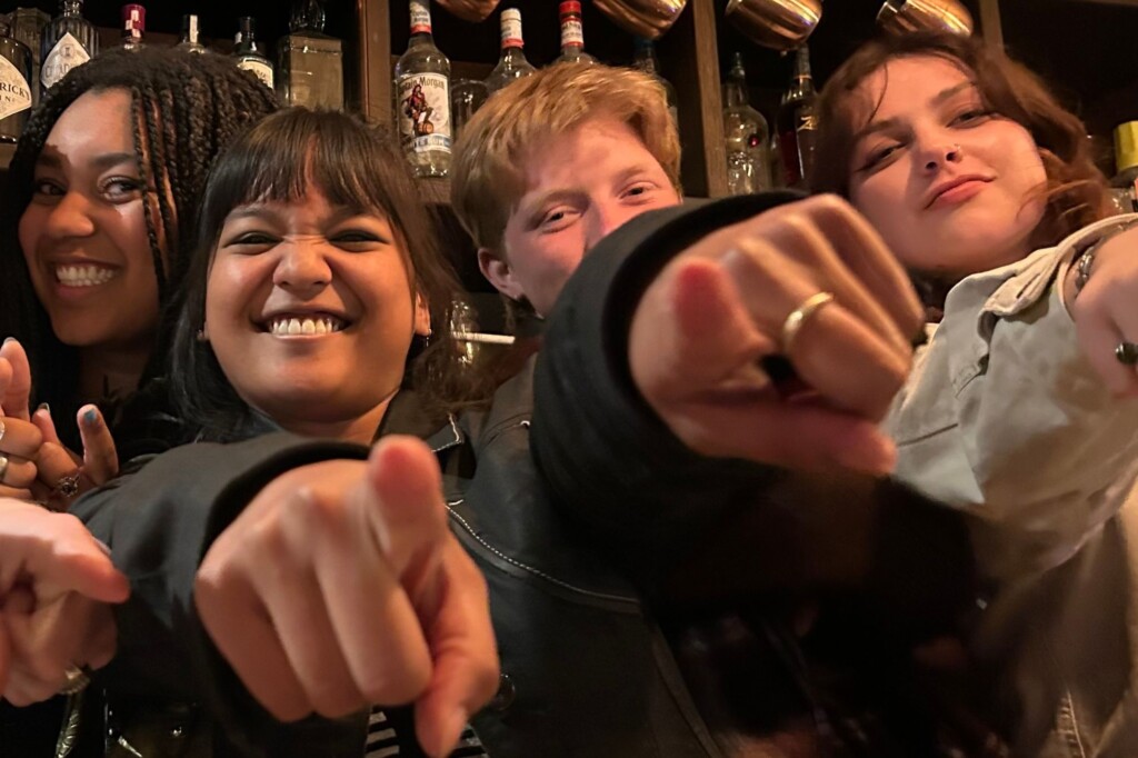London Perelli (UCB) with friends pointing at you