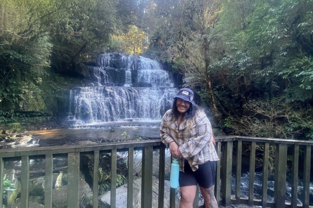 Mercedes Lefiti (UC Santa Cruz) by a waterfall in New Zealand