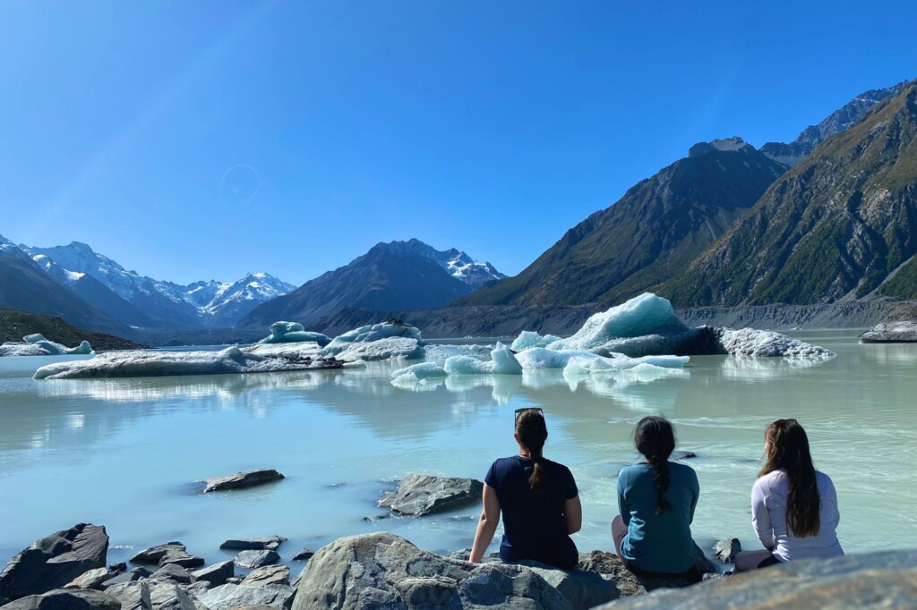 Students watching icebergs in New Zealand
