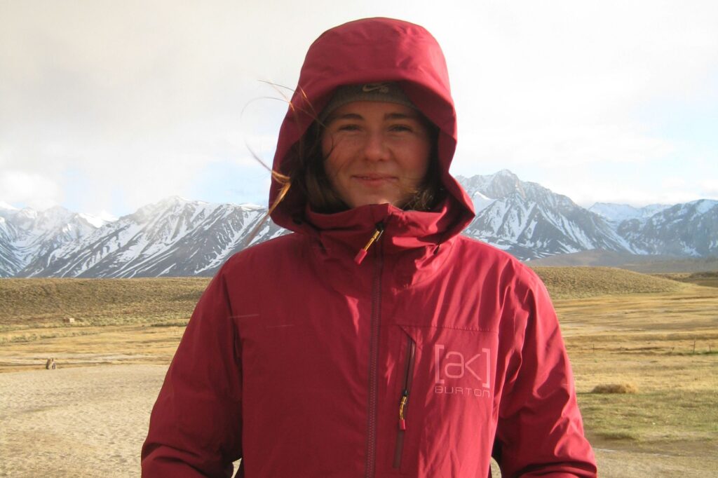 Corra Nordheim abroad with snowy peaks
