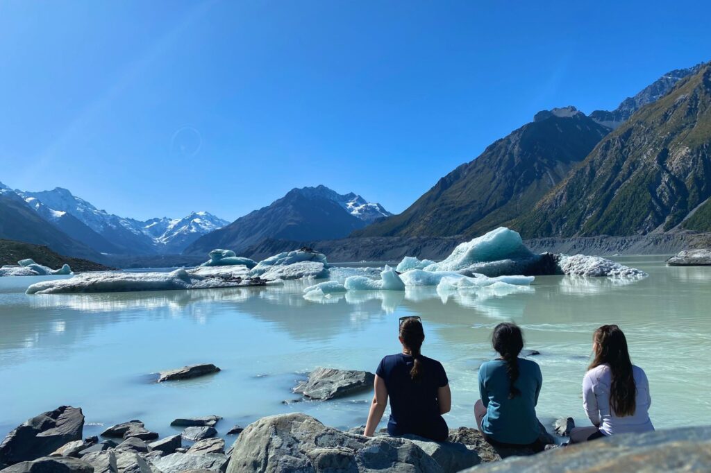 Students watching icebergs