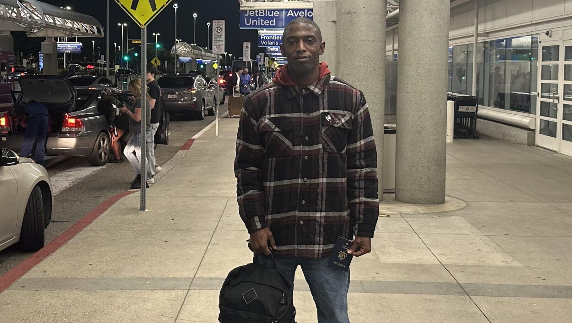 Denmark Harris at the Ontario airport heading abroad
