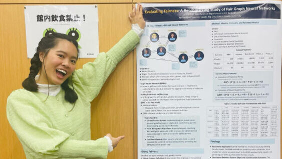 f61cc971-c294-4a38-ba16-4c584095f229 UCEAP undergraduate research award winner showing their poster