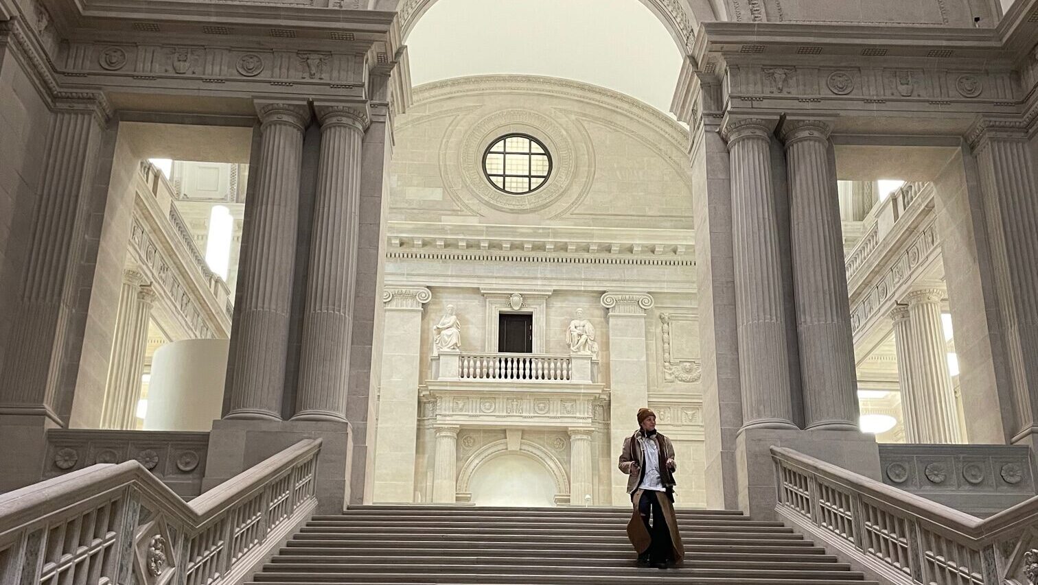 Wayne Dewing on the steps of Humboldt University in Germany