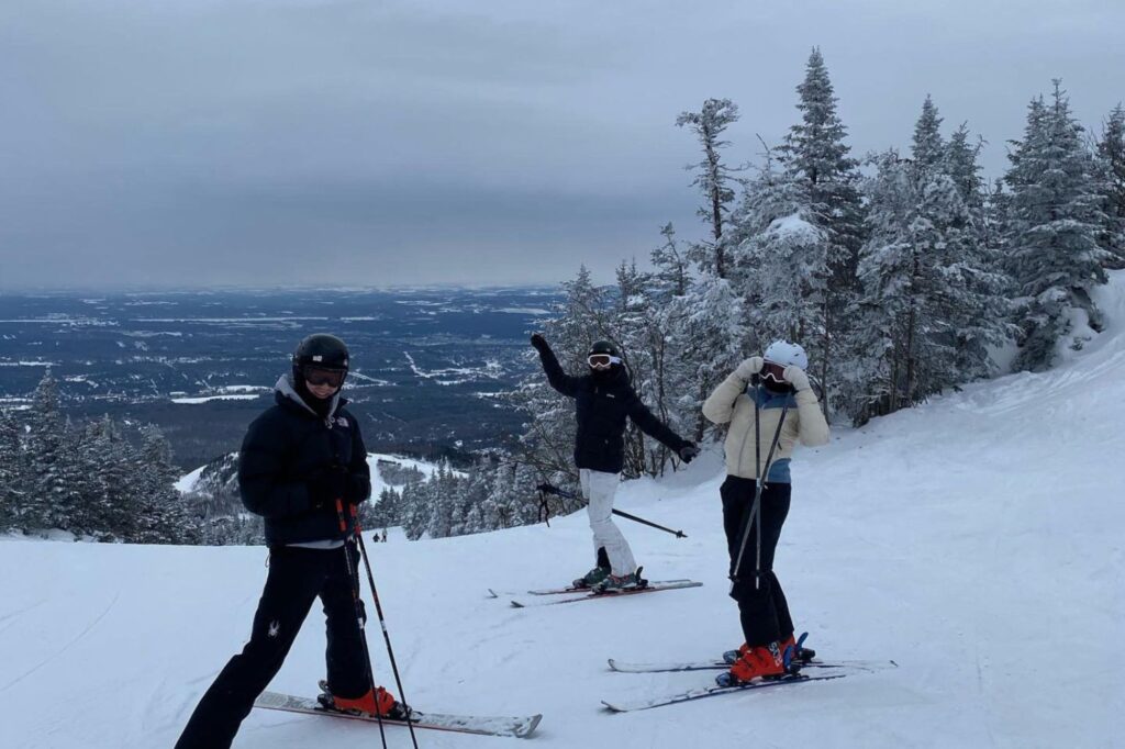 Lily with friends skiing in Canada
