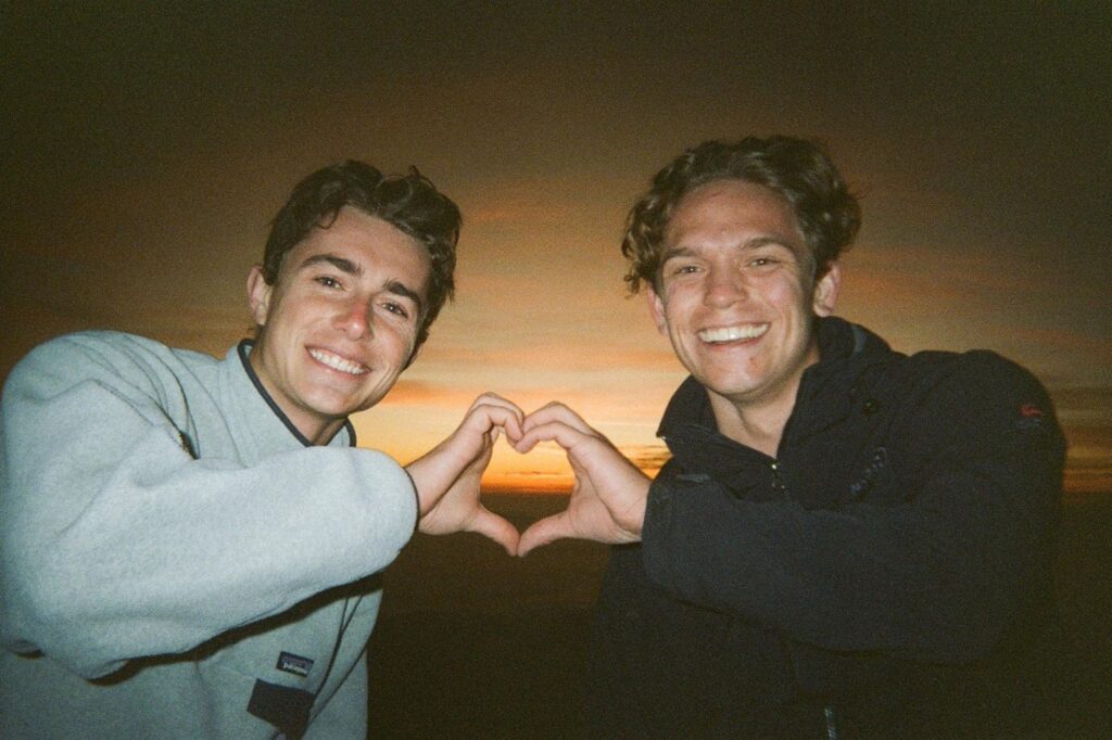 Clark Boyce with a new friend from the Netherlands on a summit at sunrise