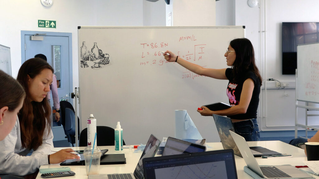 Glasgow flipped classroom with student at whiteboard
