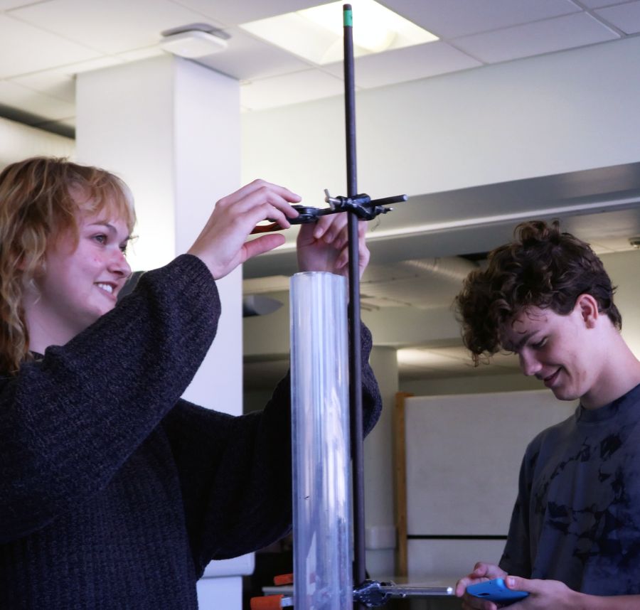 Two UC students in a Glasgow lab on a summer physics program
