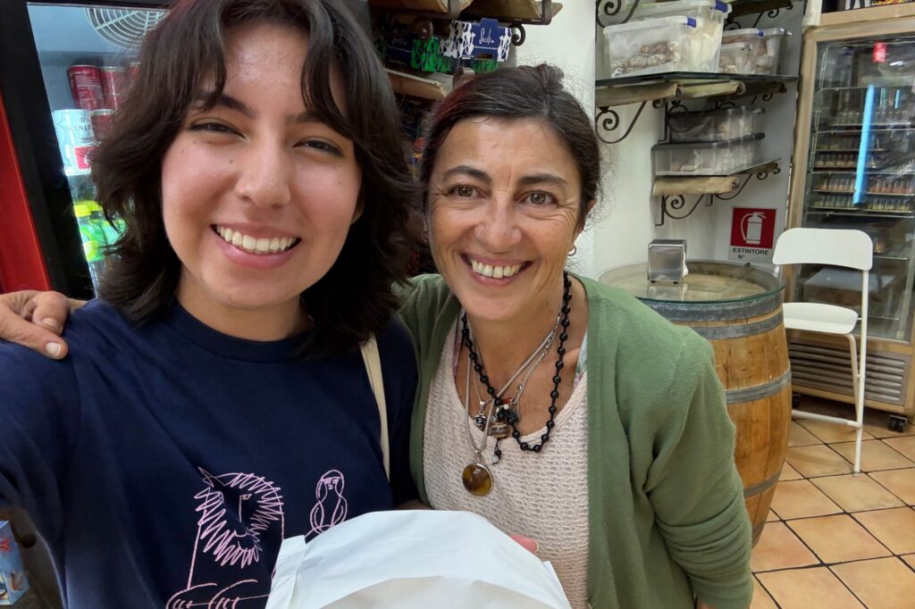 Stacy Valentin with Sicilian pastry shop owner