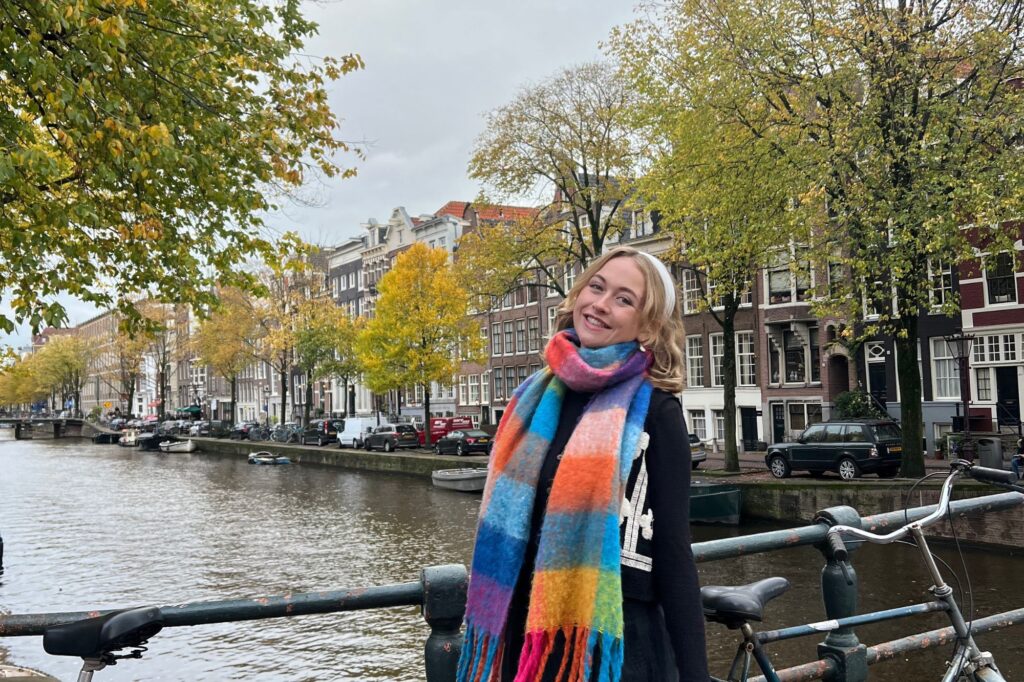 Claire Scott on a bridge over a canal
