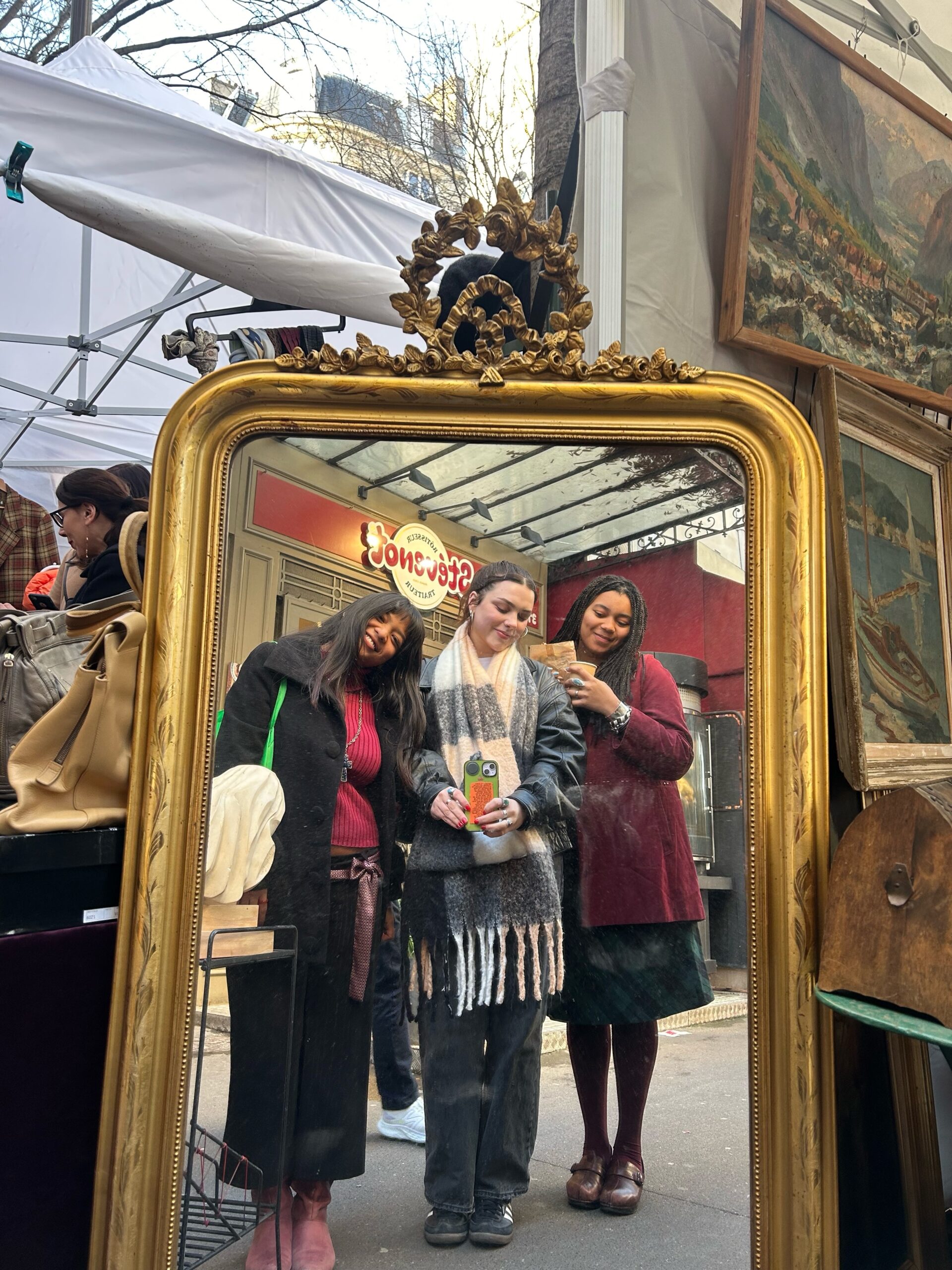 London with friends trying on clothes in Paris